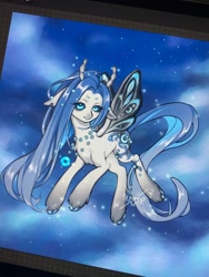 Size: 1536x2048 | Tagged: safe, artist:periwinki3, oc, oc only, oc:reverie (periwinki3), butterfly, butterfly pony, hybrid, pony, blue eyes, blue mane, blue tail, butterfly pony oc, chest fluff, cloud, coat markings, colored eyebrows, colored hooves, colored horns, concave belly, eye clipping through hair, facial markings, female, floppy ears, flying, gradient legs, horns, in air, jewelry, long mane, long tail, looking at you, mare, necklace, night, pony oc, procreate app, shiny hooves, shiny mane, shiny tail, signature, sky background, smiling, smiling at you, snip (coat marking), solo, sparkles, stars, straight mane, straight tail, tail, torn ear, unshorn fetlocks, white coat, wingding eyes
