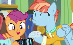 Size: 1024x641 | Tagged: safe, edit, edited screencap, screencap, scootaloo, windy whistles, pegasus, pony, g4, parental glideance, ^^, bag, camera, clothes, cropped, cute, cutealoo, diaper, duo, eyes closed, female, filly, foal, freckles, holding, jacket, looking at each other, looking at someone, mare, open mouth, open smile, saddle bag, scootalove, smiling, smiling at each other, spread wings, windybetes, wings