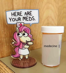 Size: 958x1063 | Tagged: safe, artist:punkittdev, fluttershy, pegasus, semi-anthro, g4, clothes, cute, dialogue, dress, female, flutternurse, irl, mare, nurse outfit, open mouth, open smile, photo, pill bottle, shyabetes, smiling, solo, speech bubble, standee, take your meds