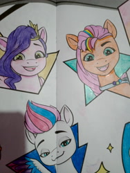 Size: 3120x4160 | Tagged: safe, pipp petals, sunny starscout, zipp storm, earth pony, pegasus, pony, g5, coloring page, crown, female, frame, irl, jewelry, mane stripe sunny, mare, open mouth, photo, regalia, royal sisters (g5), siblings, sisters, traditional art, trio, wings
