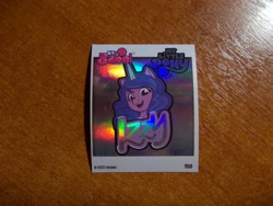 Size: 1024x768 | Tagged: safe, izzy moonbow, unicorn, g5, official, 2d, happy, horn, indonesian, logo, looking at you, merchandise, photo, shiny, smiling, smiling at you, sticker