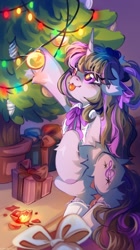 Size: 1432x2560 | Tagged: safe, artist:vanilla-chan, octavia melody, pony, unicorn, g4, christmas, christmas lights, christmas tree, cute, eye clipping through hair, eyebrows, eyebrows visible through hair, female, floppy ears, fluffy, holiday, hoof hold, horn, indoors, looking up, mare, present, race swap, signature, solo, standing on two hooves, tavibetes, tongue out, tree