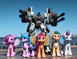 Size: 1019x784 | Tagged: safe, artist:dingopatagonico, hitch trailblazer, izzy moonbow, pipp petals, sunny starscout, zipp storm, alicorn, earth pony, pegasus, unicorn, g5, gundam, gundam wing, horn, male, photo, serpent mobile suit, stallion