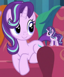Size: 505x607 | Tagged: safe, screencap, starlight glimmer, pony, unicorn, g4, it isn't the mane thing about you, april fools 2024, behaving like a cat, couch, cropped, cute, desktop ponies, female, glimmerbetes, hair over one eye, horn, mare, pixel art, self paradox, self ponidox, sitting, smiling, solo, sprite