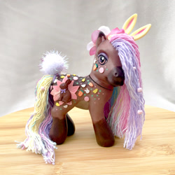 Size: 2048x2048 | Tagged: safe, artist:madisockz, oc, oc only, oc:daisy petals, earth pony, pony, alternate versions at source, body freckles, brown eyes, bunny ears, bunny tail, coat markings, colored belly, colored muzzle, customized toy, dreadlocks, earth pony oc, easter, eyeshadow, facial markings, female, freckles, hair accessory, hair over one eye, heart, heart eyes, high res, holiday, irl, makeup, mare, mealy mouth (coat marking), multicolored mane, multicolored tail, pale belly, photo, pink eyes, socks (coat markings), solo, tail, toy, wingding eyes