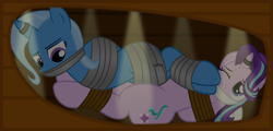 Size: 2500x1204 | Tagged: safe, artist:cardshark777, starlight glimmer, trixie, pony, unicorn, g4, bondage, bound and gagged, box, cloth gag, digital art, female, gag, helpless, hoof on cheek, horn, horn ring, lesbian, lidded eyes, lying down, magic suppression, mare, one eye closed, pun, ring, ship:startrix, shipping, tied up, trixie is not amused, unamused, visual pun