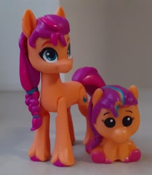 Size: 1621x1859 | Tagged: safe, sunny starscout, earth pony, pony, g5, comparison, horn, irl, mane stripe sunny, merchandise, pencil topper, photo, self paradox, self ponidox, toy