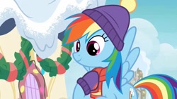 Size: 1200x675 | Tagged: safe, screencap, rainbow dash, pegasus, pony, g4, my little pony best gift ever, candle, clothes, cute, dashabetes, female, flying, hat, mare, scarf, smiling, solo, winter outfit