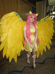 Size: 828x1104 | Tagged: safe, artist:sharidakenplz, fluttershy, human, clothes, cosplay, costume, irl, irl human, large wings, metrocon, photo, wings