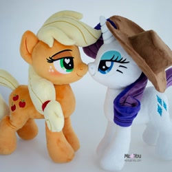 Size: 1600x1600 | Tagged: safe, artist:meplushyou, applejack, rarity, earth pony, pony, unicorn, g4, accessory swap, bedroom eyes, boop, cowboy hat, female, freckles, happy, hat, heart, heart eyes, horn, irl, lesbian, lidded eyes, long mane, looking at each other, looking at someone, nose to nose, noseboop, photo, plushie, ponytail, ship:rarijack, shipping, smiling, smiling at each other, standing, toy, wingding eyes