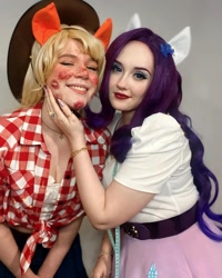 Size: 1080x1350 | Tagged: safe, applejack, rarity, human, g4, clothes, cosplay, costume, duo, duo female, female, implied lesbian, implied rarijack, implied shipping, irl, irl human, kiss mark, lipstick, measuring tape, photo