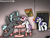 Size: 2160x1620 | Tagged: safe, artist:blossomeclipse, rarity, sweetie belle, thunderlane, pegasus, pony, unicorn, age difference, blue blush, blushing, caught, cup, female, filly, foal, horn, implied foalcon, kiss on the lips, kissing, male, mare, poster, shipping, spread wings, stallion, story included, straight, sweetielane, tea party, teacup, trio, wingboner, wings
