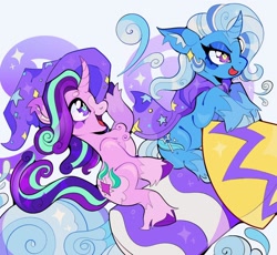 Size: 1310x1205 | Tagged: safe, artist:infinithiez, starlight glimmer, trixie, pony, unicorn, g4, :p, alternate design, beanbrows, blaze (coat marking), blue coat, blue mane, blue tail, blush sticker, blushing, cape, chest fluff, clothes, cloven hooves, coat markings, colored ear fluff, colored eartips, colored eyebrows, colored eyelashes, colored hooves, colored horn, colored muzzle, colored pinnae, curved horn, cute, diatrixes, duo, duo female, ear fluff, ear tufts, eyebrows, eyelashes, eyeshadow, facial markings, female, glimmerbetes, hat, holding hat, hoof hold, horn, lesbian, makeup, mare, narrowed eyes, open mouth, open smile, pink coat, profile, purple eyes, riding, rocket, ship:startrix, shipping, simple background, sitting, smiling, socks (coat markings), sparkles, tail, thick eyelashes, tongue out, toy interpretation, trixie's cape, trixie's hat, trixie's rocket, two toned mane, two toned tail, unshorn fetlocks, wavy mane, wavy tail, white background, wingding eyes