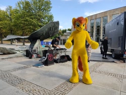 Size: 1280x960 | Tagged: safe, artist:atalonthedeer, artist:silou_atien, oc, oc:canni soda, human, galacon, 2022, convention, food truck, fountain, fursuit, irl, irl human, outdoors, photo, ponysuit
