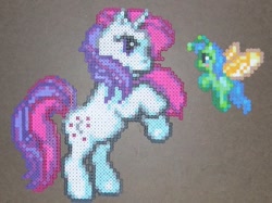 Size: 600x448 | Tagged: safe, artist:sparksparkles, moondancer (g1), breezie, pony, unicorn, g1, g3, my little pony: pinkie pie's party, craft, g1 to g3, generation leap, horn, perler beads, rearing, unnamed breezie, unnamed character