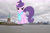 Size: 2294x1524 | Tagged: safe, artist:cheezedoodle96, edit, editor:jaredking779, suri polomare, earth pony, pony, g4, attack on pony, female, giant pony, giantess, highrise ponies, irl, jersey city, looking at you, macro, manhattan, mare, necktie, new york, new york city, photo, ponies in real life, red eyes, smiling, solo, statue of liberty, story included