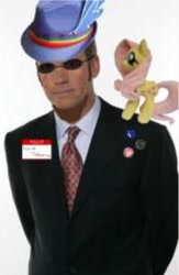 Size: 284x436 | Tagged: safe, fluttershy, human, pegasus, pony, g4, brony, chris hansen, female, glasses, hat, irl, irl human, mare, meme, necktie, photo, plushie, simple background, solo, white background