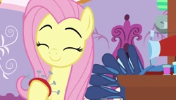 Size: 1920x1088 | Tagged: safe, screencap, fluttershy, pegasus, dragon dropped, g4, season 9, carousel boutique, cute, eyebrows, happy, holding, pink hair, pink mane, room, sewing machine, shyabetes, sitting, smiling, solo, yellow fur