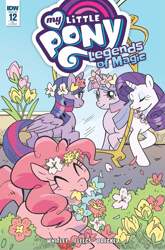 Size: 2063x3131 | Tagged: safe, artist:meaghan carter, idw, official comic, pinkie pie, rarity, twilight sparkle, alicorn, earth pony, pony, unicorn, g4, legends of magic #12, my little pony: legends of magic, comic cover, cover, cover art, eyes closed, female, floral head wreath, floral necklace, flower, folded wings, horn, looking at mirror, mare, mirror, mouth hold, my little pony logo, smiling, trio, trio female, twilight sparkle (alicorn), variant cover, wings