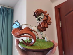 Size: 4624x3472 | Tagged: safe, artist:griffonleek, artist:tinybenz, autumn blaze, butterfly, kirin, g4, blushing, butterfly on tail, craft, cute, female, figurine, hoof fluff, insect on tail, leonine tail, multiple angles, open mouth, photo, picture, raised hoof, raised leg, smiling, solo, tail, yellow eyes