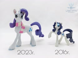 Size: 2560x1920 | Tagged: safe, artist:lakterra, rarity, pony, unicorn, g4, alternate hairstyle, clothes, comparison, craft, female, figurine, horn, irl, mare, photo, polymer clay, raised hoof, scarf, signature, solo, striped scarf, tail, unshorn fetlocks
