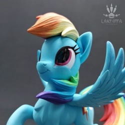 Size: 2560x2560 | Tagged: safe, artist:lakterra, rainbow dash, pegasus, pony, g4, close-up, craft, female, figurine, irl, looking up, mare, photo, polymer clay, raised hoof, signature, smiling, solo, spread wings, tail, wings