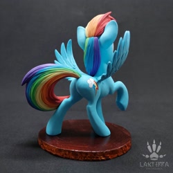 Size: 2560x2560 | Tagged: safe, alternate angle, alternate version, artist:lakterra, rainbow dash, pegasus, pony, g4, butt, craft, female, figurine, irl, mare, photo, plot, polymer clay, raised hoof, rear view, signature, solo, spread wings, stand, tail, underhoof, wings