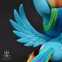 Size: 2560x2560 | Tagged: safe, alternate angle, alternate version, artist:lakterra, rainbow dash, pegasus, pony, g4, both cutie marks, butt, close-up, craft, female, figurine, high angle, irl, mare, photo, plot, polymer clay, signature, solo, spread wings, stand, tail, wings