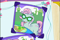 Size: 720x480 | Tagged: safe, screencap, minty, earth pony, pony, a charming birthday, g3, cucumber, female, food, mare, open mouth, open smile, pizza, plate, ponyville surprise birthday book, scrapbook, smiling, solo, sunglasses, table