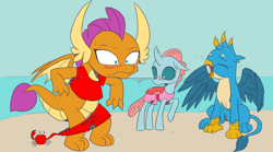 Size: 2560x1428 | Tagged: safe, artist:nauyaco, color edit, edit, gallus, ocellus, smolder, changedling, changeling, dragon, griffon, g4, beach, blushing, clothes, colored, coppertone parody, embarrassed, embarrassed nude exposure, female, laughing, male, nudity, pantsed, swimsuit, trio, we don't normally wear clothes