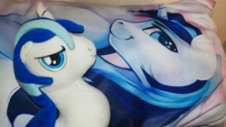 Size: 2048x1152 | Tagged: safe, shining armor, pony, unicorn, g4, body pillow, dakimakura cover, horn, irl, looking at you, photo, plushie