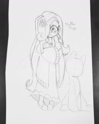 Size: 1440x1800 | Tagged: safe, artist:comicmaker, fluttershy, human, pony, g4, blush lines, blushing, clothes, crossed arms, cutie mark eyes, dress, female, frown, hair over one eye, humanized, monochrome, sketch, traditional art, wingding eyes