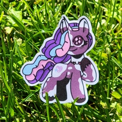Size: 8192x8192 | Tagged: safe, artist:comicmaker, violette rainbow, pony, unicorn, g5, dreadlocks, female, filly, foal, grass, hair over one eye, horn, irl, jewelry, necklace, outdoors, photo, raised hoof, smiling, solo, sparkly eyes, sticker, tail, unshorn fetlocks, vitiligo, wingding eyes