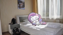 Size: 1080x606 | Tagged: safe, potion nova, pony, unicorn, all that jitters, g4, g4.5, my little pony: pony life, bed, horn, irl, photo, ponies in real life, sleeping, solo