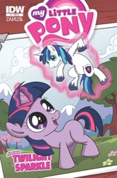 Size: 659x1000 | Tagged: safe, artist:sibsy, idw, official comic, shining armor, twilight sparkle, pony, unicorn, g4, micro-series #1, my little pony micro-series, spoiler:comic, comic cover, cover, cover art, female, filly, filly twilight sparkle, flower, foal, glowing, glowing horn, horn, levitation, looking up, magic, mountain, my little pony logo, open mouth, open smile, smiling, tail, telekinesis, tree, unicorn twilight, unshorn fetlocks, variant cover, younger