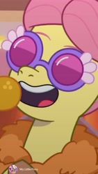 Size: 2817x5000 | Tagged: safe, screencap, posey bloom, earth pony, pony, g5, my little pony: tell your tale, spoiler:g5, spoiler:my little pony: tell your tale, female, happy, mare, microphone, novelty glasses, open mouth, open smile, smiling, solo, sunglasses