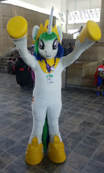 Size: 828x1375 | Tagged: safe, artist:atalonthedeer, bronycon, bronycon 2019, arms in the air, fursuit, indoors, irl, photo, ponysuit, solo