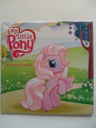 Size: 455x606 | Tagged: safe, pinkie pie (g3), earth pony, pony, g3, g3.5, 2011, calendar, female, mare, merchandise, my little pony logo, photo, rainbow, rearing, solo, tree