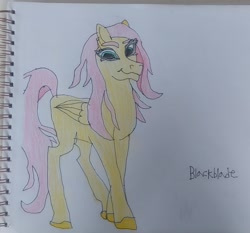 Size: 2796x2604 | Tagged: safe, artist:blackblade360, fluttershy, pegasus, pony, g4, alternate design, alternate hairstyle, colored pencil drawing, crossover, female, folded wings, high res, irl, long mane, long tail, looking at you, mare, missing cutie mark, paper, photo, pose, signature, smiling, smiling at you, solo, tail, traditional art, wild manes, wild manesified, wings