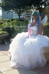 Size: 1500x2250 | Tagged: safe, princess celestia, human, bronycon, bronycon 2018, g4, bare shoulders, clothes, cosplay, costume, gloves, irl, irl human, long gloves, photo, sitting, solo