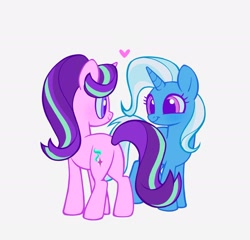 Size: 2048x1969 | Tagged: safe, artist:delzol, starlight glimmer, trixie, pony, unicorn, g4, blue sclera, butt, colored eyelashes, colored pupils, colored sclera, coloreed pup, cute, diatrixes, duo, duo female, female, floating heart, glimmerbetes, grin, hair over one eye, heart, horn, lesbian, looking at each other, looking at someone, plot, purple eyelashes, purple pupils, ship:startrix, shipping, simple background, smiling, smiling at each other, standing