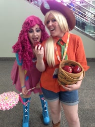 Size: 600x800 | Tagged: safe, artist:sarahndipity cosplay, applejack, pinkie pie, human, bronycon, bronycon 2015, equestria girls, g4, apple, clothes, cosplay, costume, duo, duo female, female, food, irl, irl human, photo