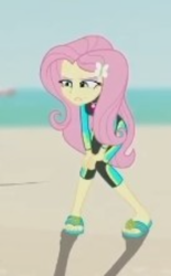 Size: 250x403 | Tagged: safe, screencap, fluttershy, human, aww... baby turtles, equestria girls, g4, my little pony equestria girls: better together, beach, clothes, cropped, female, fluttershy's wetsuit, sandals, skinny, solo, swimsuit, thin, wetsuit