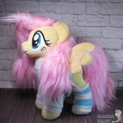 Size: 1200x1200 | Tagged: safe, artist:allunacraft, fluttershy, pony, g4, clothes, irl, photo, plushie, socks, solo, striped socks