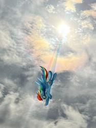 Size: 1392x1856 | Tagged: safe, artist:czscribbles, rainbow dash, pegasus, pony, g4, 2024 solar eclipse, aviator goggles, crepuscular rays, eclipse, female, flying, goggles, grin, irl, mare, photo, ponies in real life, rainbow trail, sky, smiling, solar eclipse, solo, spread wings, sun, wings