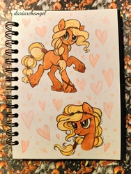 Size: 2919x3892 | Tagged: safe, artist:dariarchangel, applejack, earth pony, g4, g5, applejack (g5 concept leak), blonde, blonde hair, blonde mane, blonde tail, bracelet, braid, braided tail, bust, cute, female, freckles, g5 concept leaks, g5 to g4, generation leap, green eyes, headband, heart, jackabetes, jewelry, mare, photo, portrait, raised hoof, sketchbook, smiling, solo, standing on two hooves, tail, tail band, traditional art, unshorn fetlocks