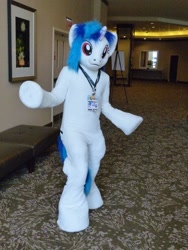 Size: 960x1280 | Tagged: safe, artist:atalonthedeer, dj pon-3, vinyl scratch, unicorn, g4, badge, corridor, fursuit, horn, indoors, irl, photo, ponysuit, solo