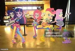 Size: 612x421 | Tagged: safe, applejack, fluttershy, pinkie pie, rarity, spike, twilight sparkle, dog, human, equestria girls, g4, female, getty images, irl, male, obtrusive text, obtrusive watermark, photo, solo, spike the dog, watermark