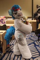 Size: 1365x2048 | Tagged: safe, artist:springbear452_, oc, oc only, oc:the living tombstone, earth pony, human, 2023, clothes, cosplay, costume, fursuit, headphones, indoors, irl, irl human, megaplex, photo, ponysuit, solo