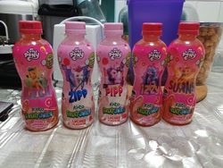 Size: 3264x2448 | Tagged: safe, hitch trailblazer, izzy moonbow, pipp petals, sunny starscout, zipp storm, g5, bottle, character, drink, food, merchandise, photo, singapore